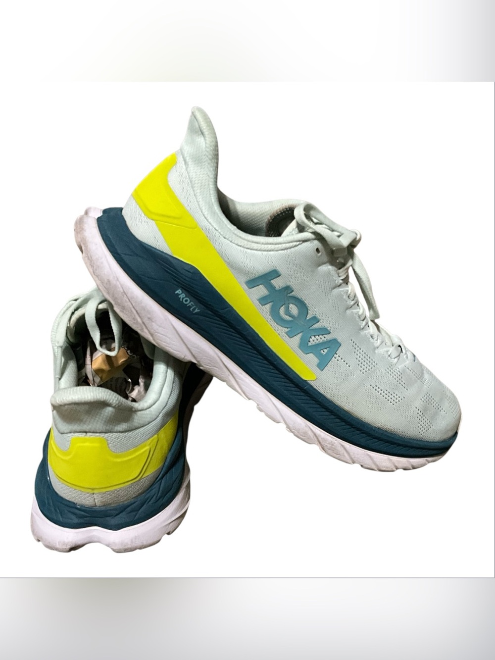 Hoka Light Mint Running Shoes with Yellow & Teal Accents,,size 9.D